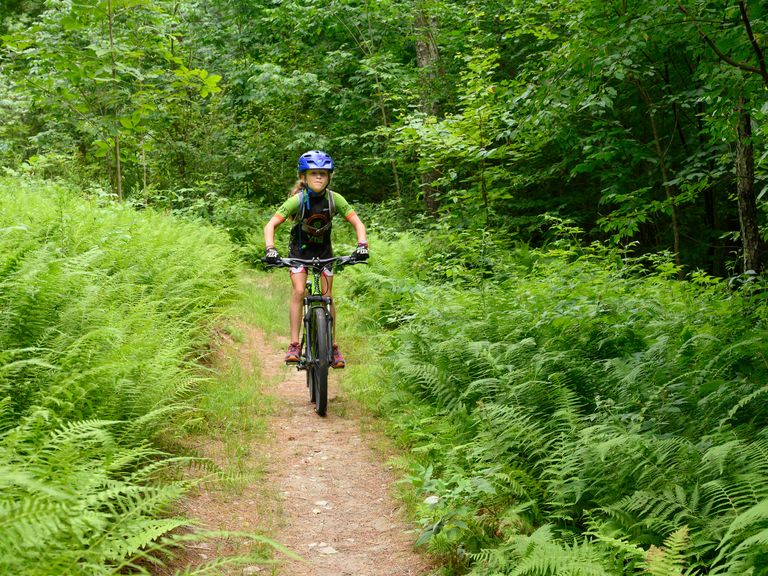 Young mountain biker on the Slate Valley Trail system Young mountain biker on the Slate Valley Trail system